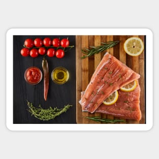 Raw salmon fillets on a wooden board Sticker